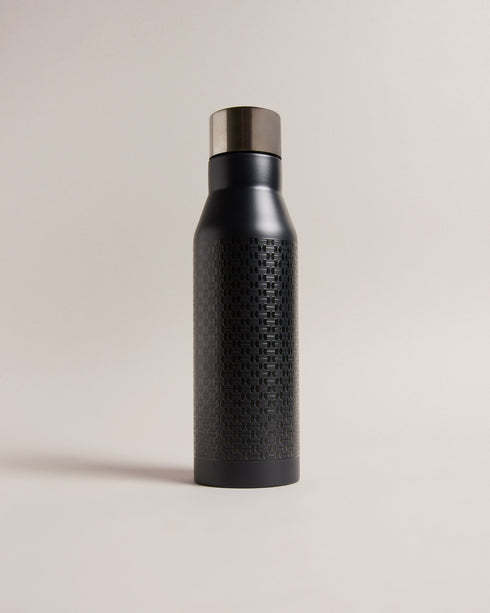 JAMESA-Gifts-Stay hydrated, and look good doing it. JAMESA is crafted from 100% stainless steel and finished with a sleek geometric pattern that adds a subtle flair to your daily routine. Water bottle Stainless steel Geometric texture Twist off cap Comes in branded box- Ted Baker Romania